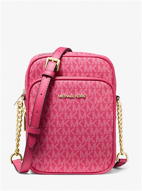 sauce in michael kors bag|Jet Set Travel Medium Signature Logo Dome Crossbody Bag.